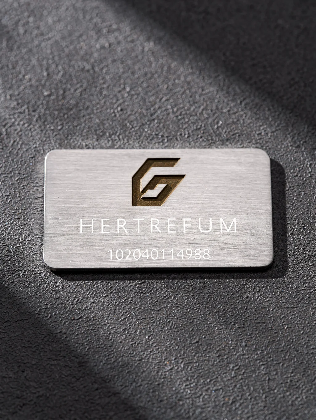 Clean laser-marked anodized aluminum identification plates